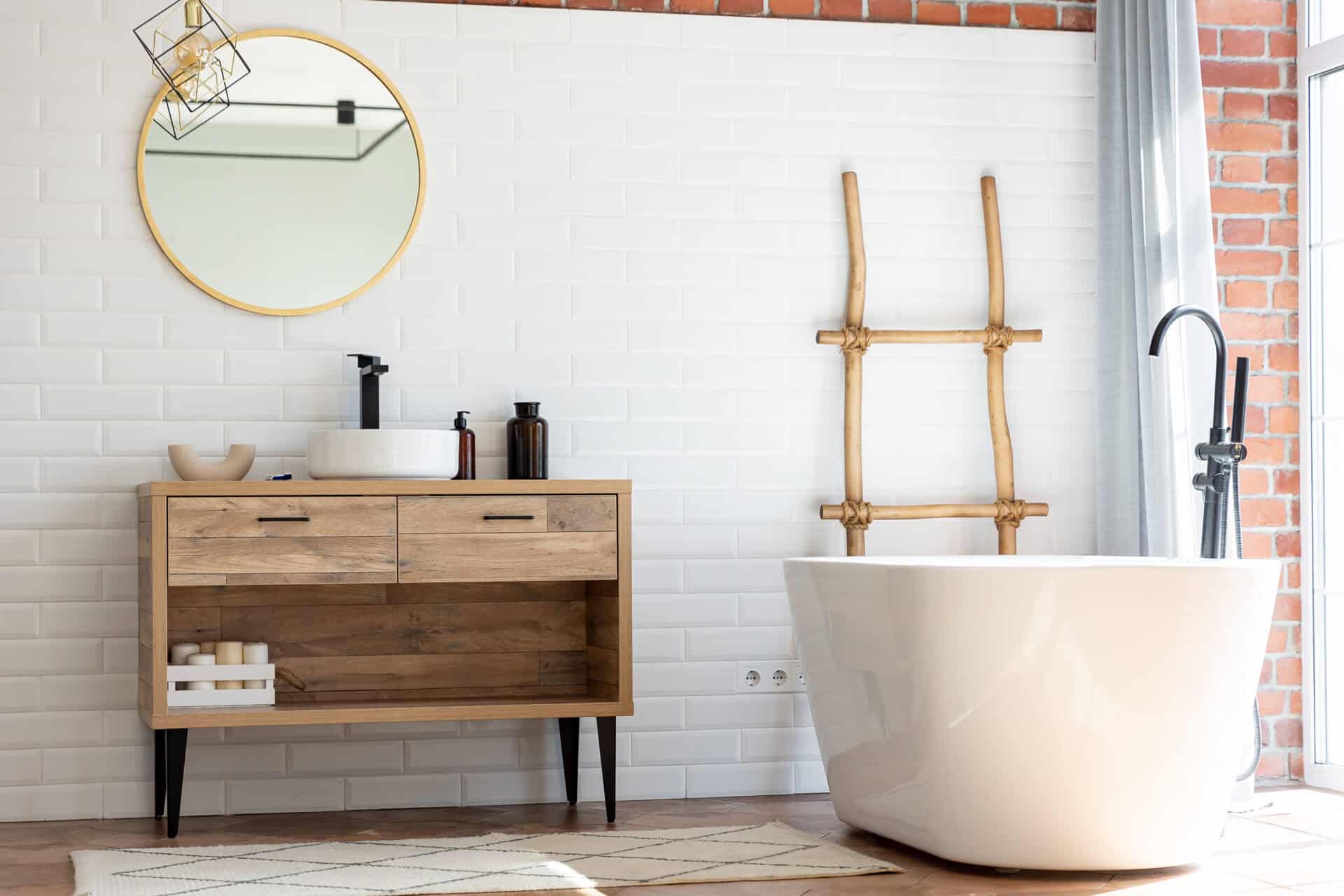 Modern bright loft scandi style bathroom, freestanding bath.